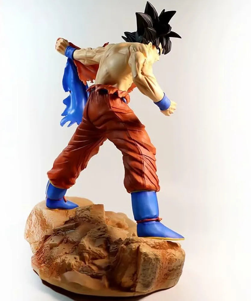 Goku tearing clothes battle scene statue